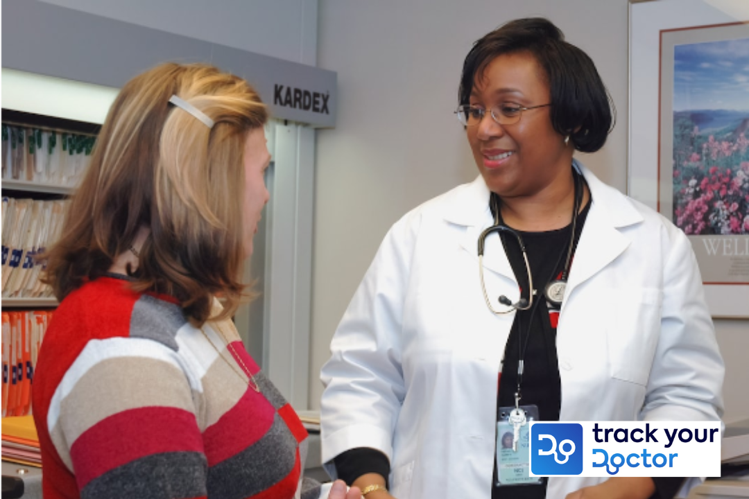 A lady doctor talking to a patient. #negative patient reviews